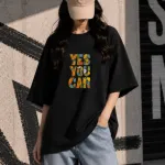 মেয়েদের ড্রপ শোল্ডার টি-শার্ট – কালো, 'YES YOU CAN' প্রিন্ট