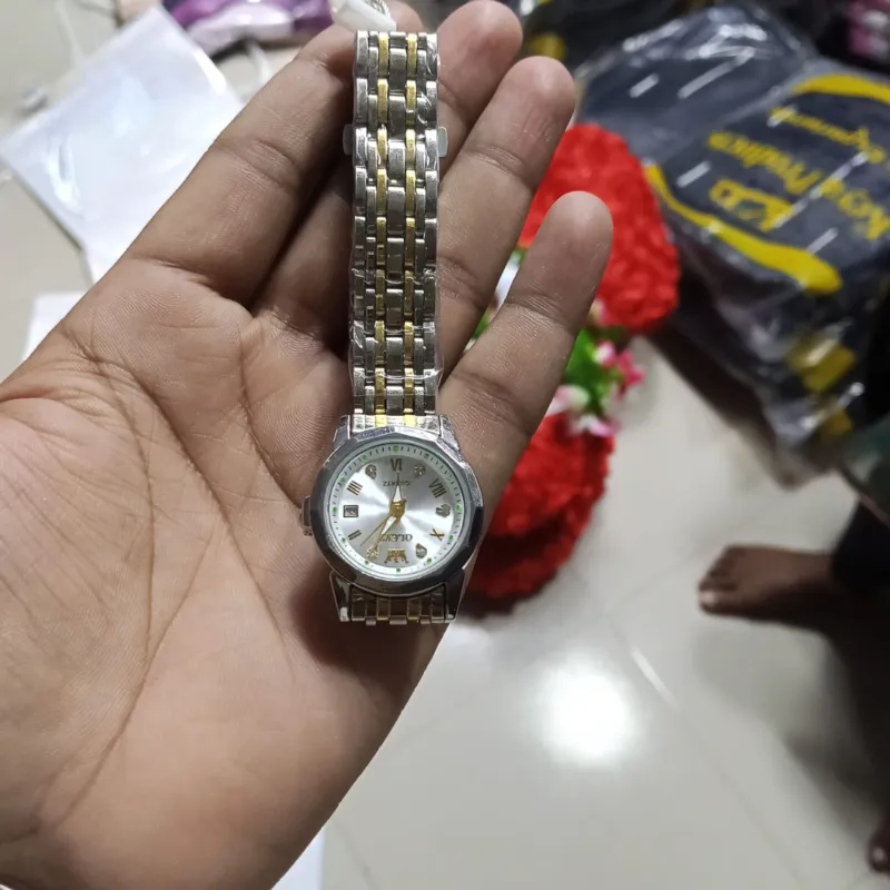 OLEVS 9931 মেয়েদের স্টেইনলেস স্টিল লুমিনাস ঘড়ি (সিলভার)