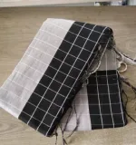 মেয়েদের কালো ও সাদা হাফসিল্ক শাড়ি
