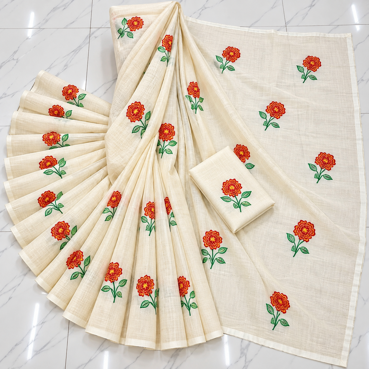 Exclusive off-white cotton saree with floral embroidery.